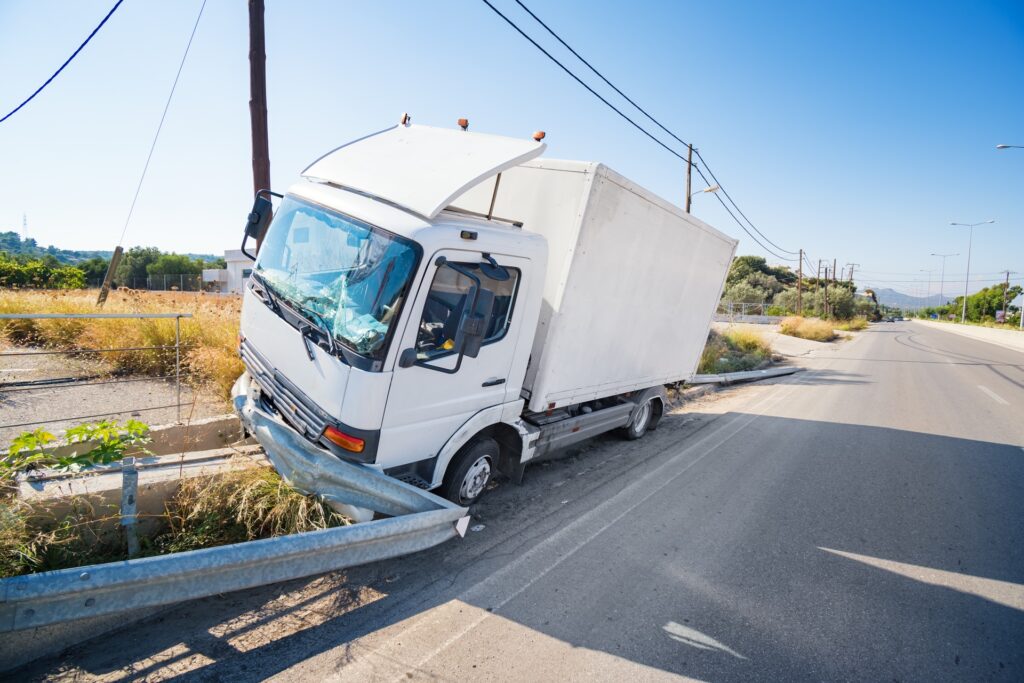 Truck Accident Hitting Side Road Barriers