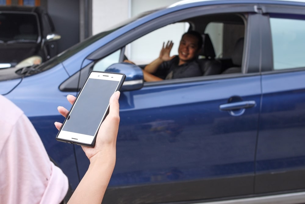 Passenger Going Towards His Rideshare Car