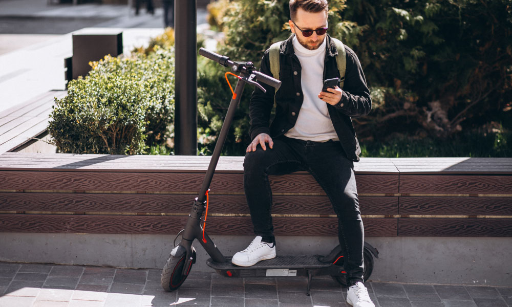 person with electric scooter